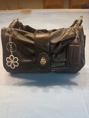 Coach rare Vintage y2k Black Leather Shoulder Bag with Silver Flower Charm